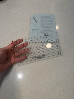 Vintage clear acrylic quilting template with black markings
